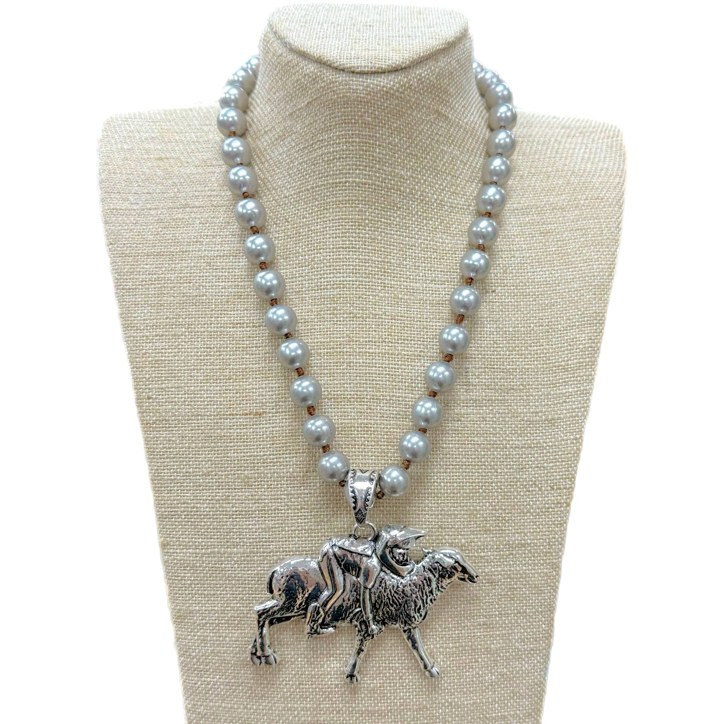 Mutton Bustin' Pendant on Faux Navajo Pearl Necklace