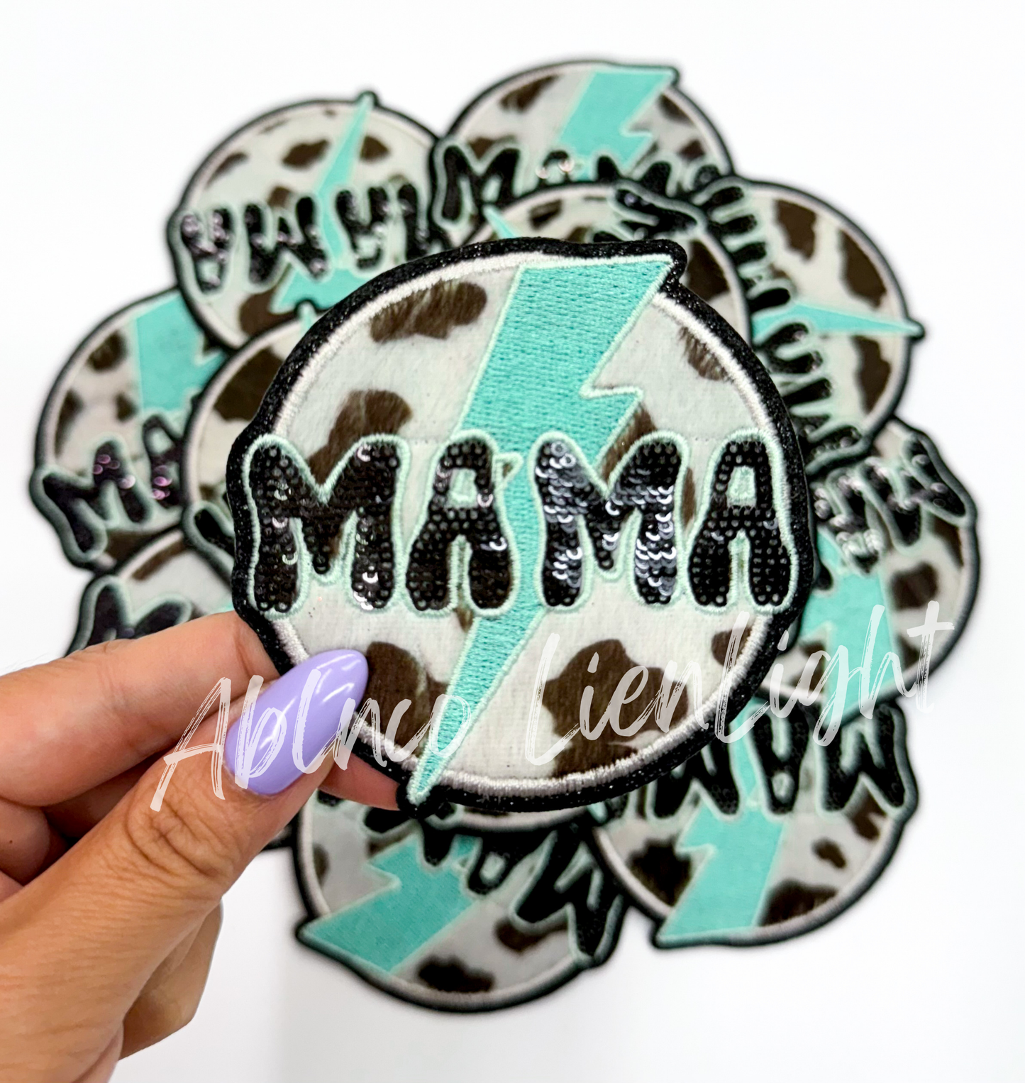 Mama fuzzy cow print turquoise bolt patch iron on