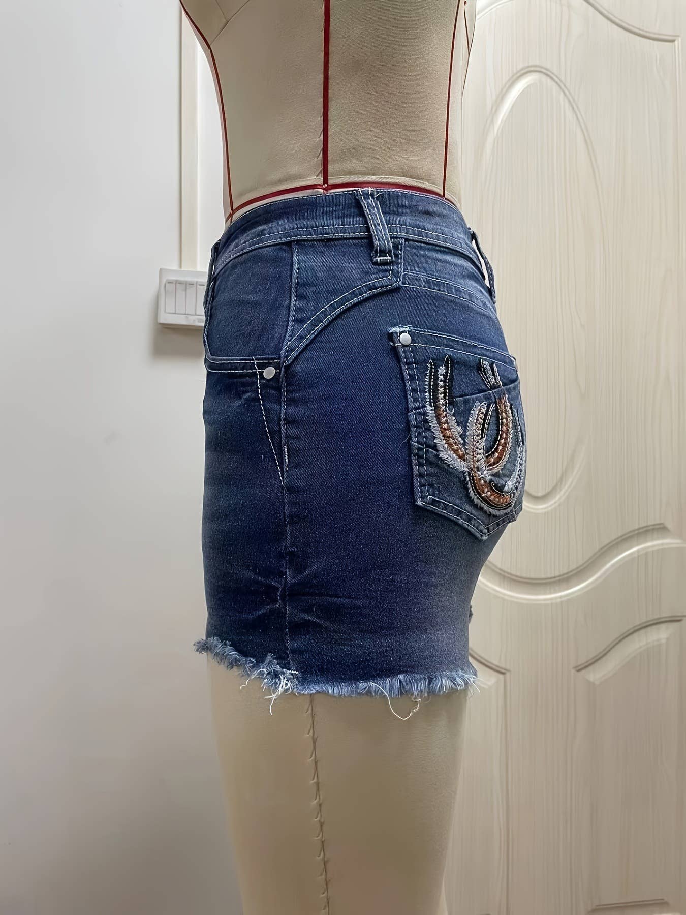 Horseshoe embroidered denim shorts